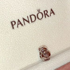 Pandora Charms little boy holds four-leaf clover
